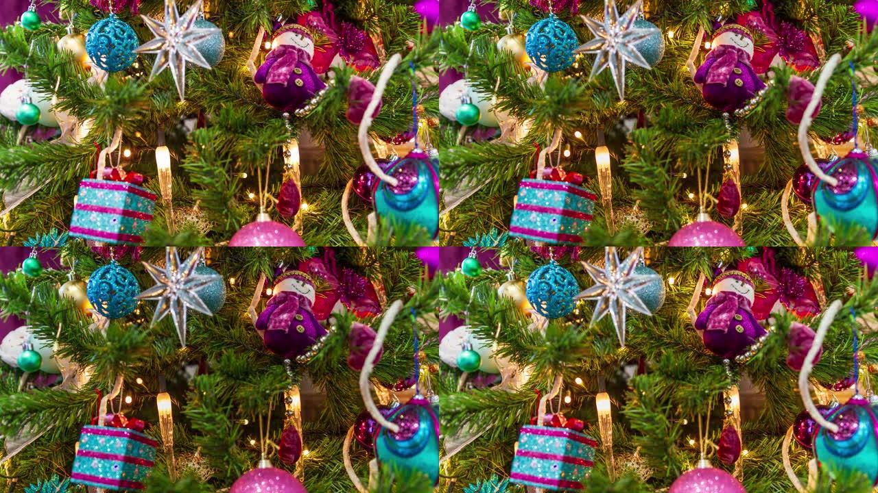 圣诞树装饰在一个紫色的主题停止运动视频。一颗星星一颗雪人一份礼物装饰球和蜡烛灯就在眼前