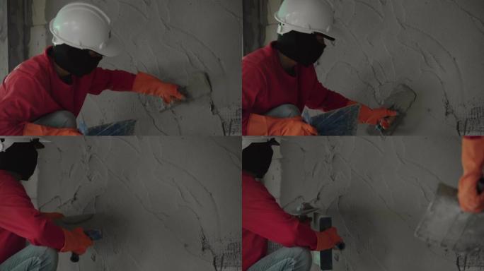 翻新房子里的墙壁水泥工抹墙安全施工