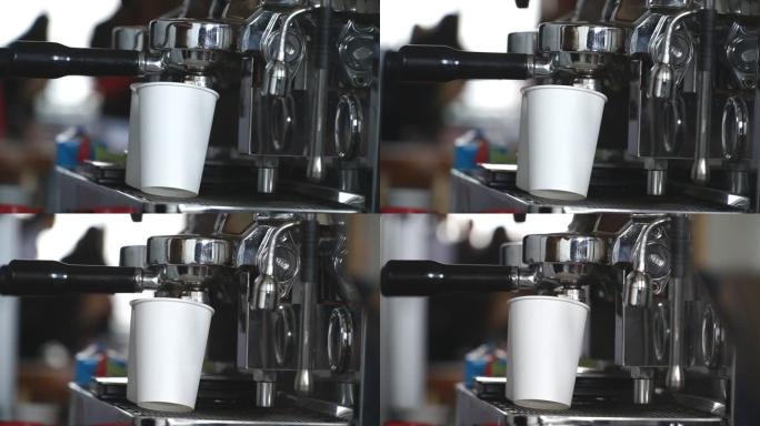 从专业咖啡机制备天然浓咖啡的观点。女性咖啡师使用过滤器支架制作新鲜芳香饮料。城市咖啡馆的工作流程。慢