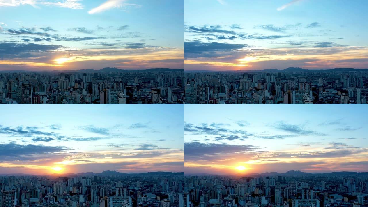 巴西圣保罗首都的延时日落。市区过度失误。城市生活场景。巴西圣保罗区的鸟瞰图。五颜六色的天际线。景观。