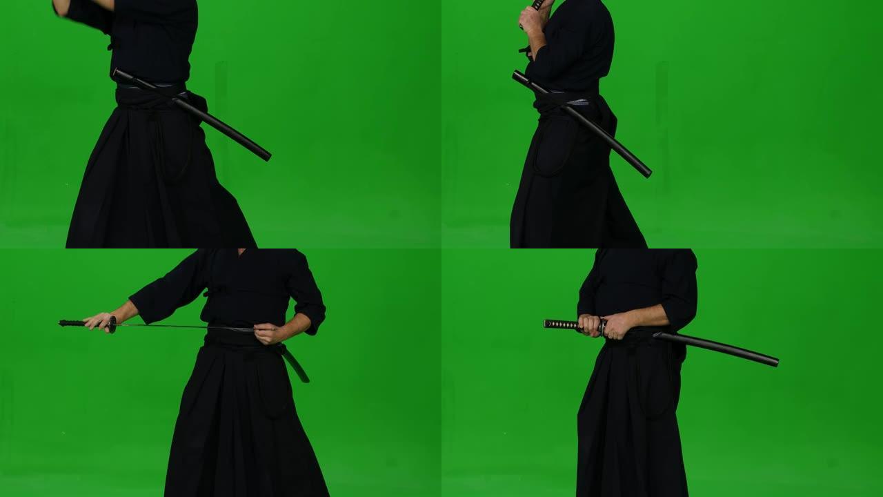 男性剑道战士在绿屏上与竹子博肯一起练习武术。特写