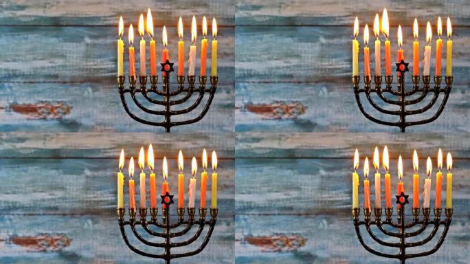 在烛台光明节 (menorah chanukah) 中点燃八支蜡烛是犹太灯节，每晚以烛台照明来庆祝