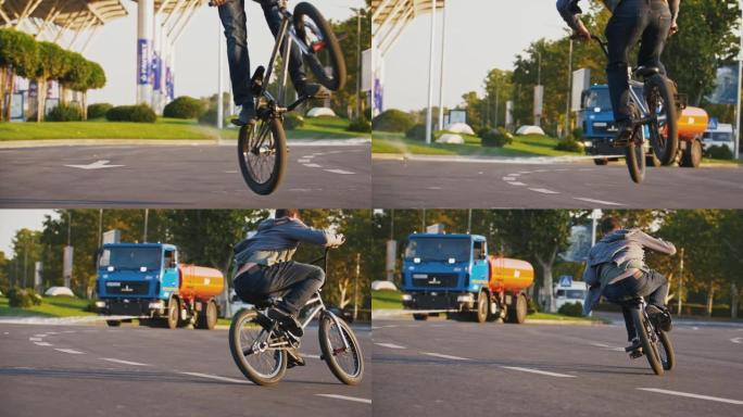不知名的少年bmx骑手正骑着自行车在空中在其轴上跳跃和旋转，在交易中心附近进行技巧