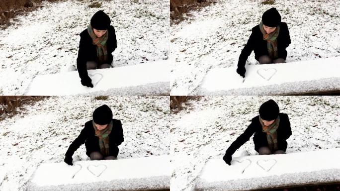 女人在雪地上画心俄罗斯雪景寒冷围巾