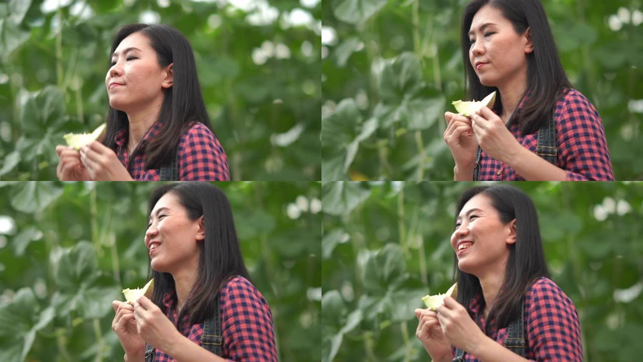 亚洲年轻女农场主测试和嗅闻瓜类作物品种进行研发，转基因食品，生物食品概念