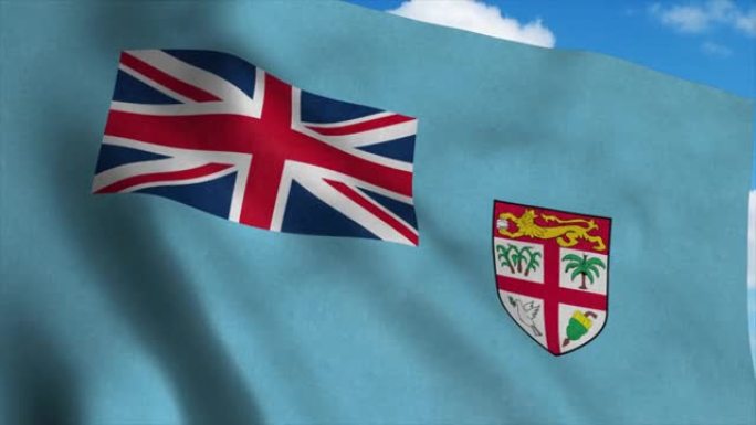 斐济国旗在风中飘扬，蓝天为背景。4 k