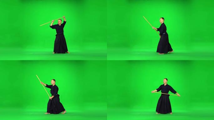 男性剑道战士在绿色屏幕上与竹子博肯一起练习武术
