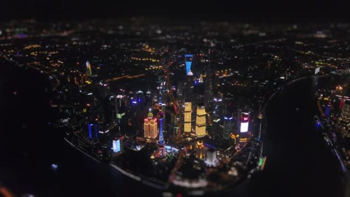 上海城市景观夜景照明浦东市区海湾航空全景4k倾斜移位中国