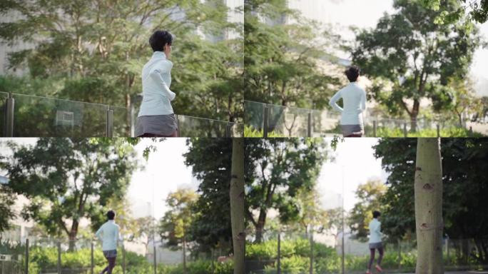 亚洲美女早上在城市公园慢跑