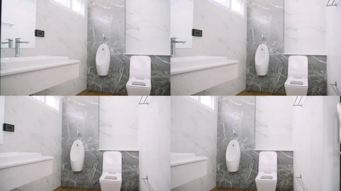 现代设计家用浴室白色洁具在浴室。在建