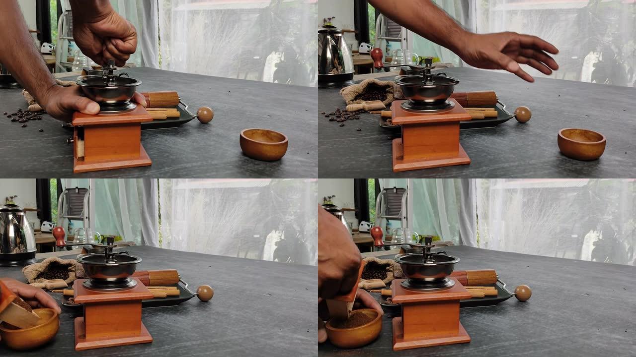 特写手工烹饪在桌子上研磨咖啡豆。