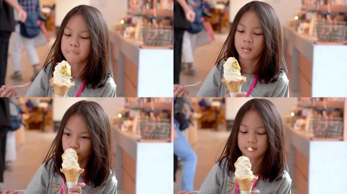 日本女孩正在金泽日本吃加黄金的冰淇淋。