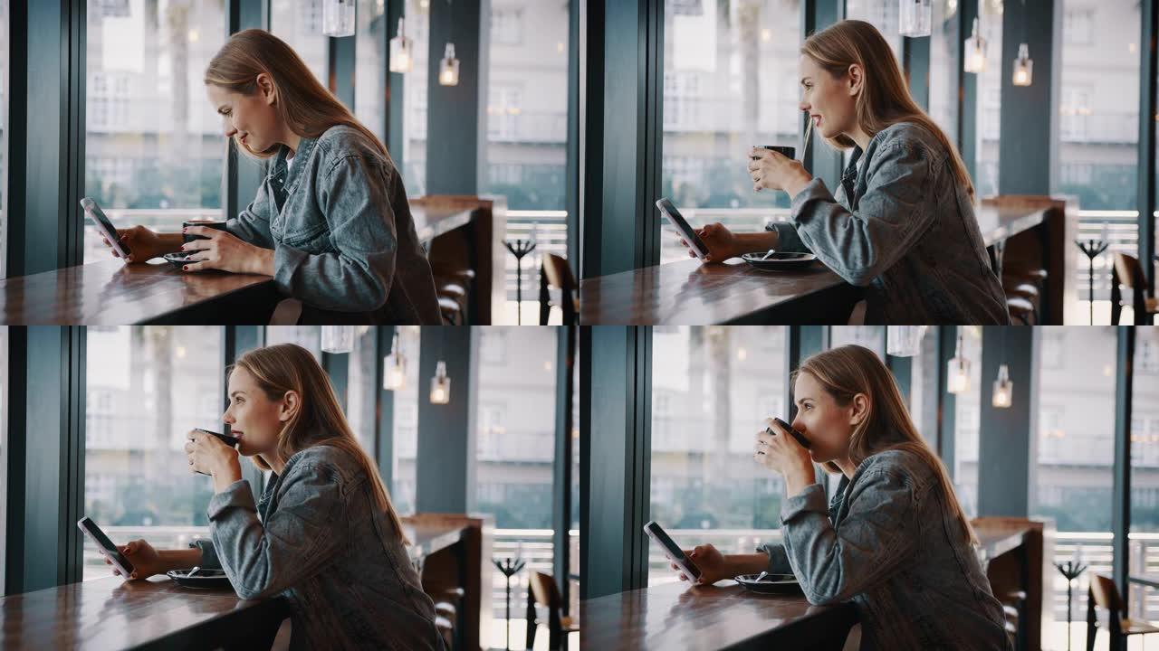 拿着手机在咖啡馆喝咖啡的女人
