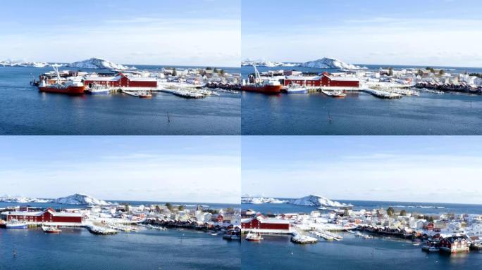 挪威北部罗弗滕群岛海边著名的传统五彩木制渔场罗布的空中俯视图