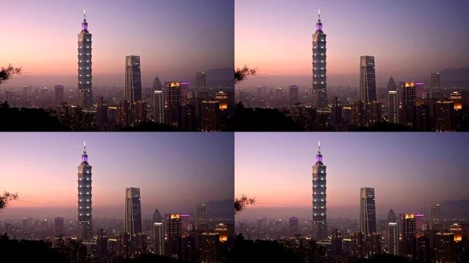 时间流逝。日落鸟瞰图台北，台湾傍晚天际线从香山的观点。