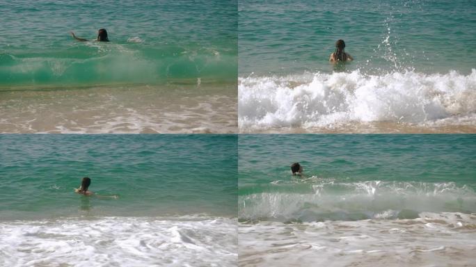 科斯塔德尔马雷斯梅海岸。快乐美丽的女人在卡莱拉海滩上玩得开心，玩弄地中海的海浪。巴塞罗那。西班牙。4