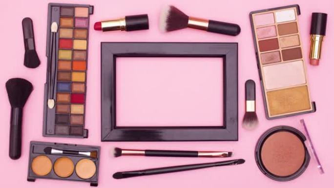 化妆产品围绕黑色框架移动粉色主题的文本。停止运动
