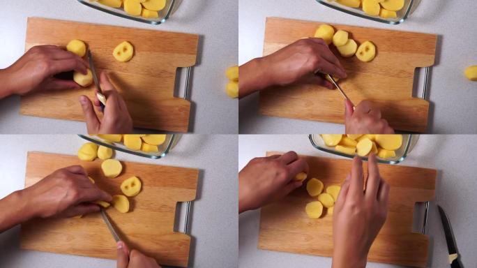 男人用菜刀将生土豆切成薄片。顶视图