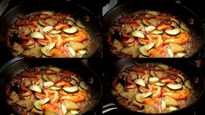 宏切蔬菜在锅上的热油中煮沸
