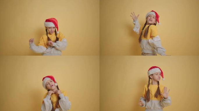 戴着圣诞老人帽子的小女孩在黄色背景慢动作中朗读诗歌