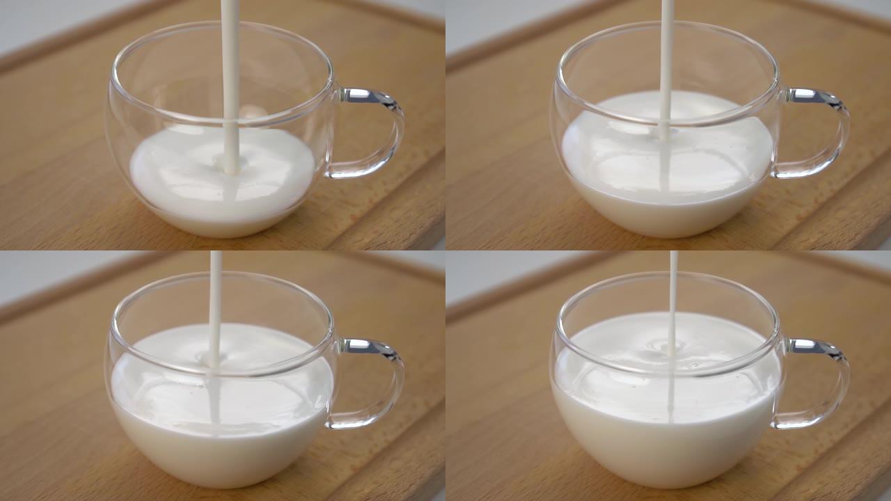 将白色浓稠的开菲尔或酸奶倒入玻璃杯中