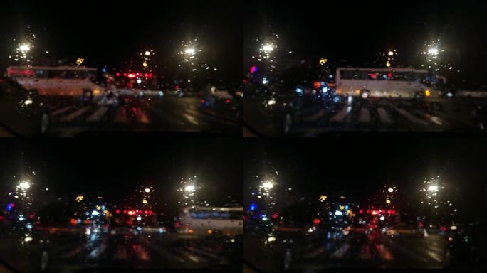 雨夜街道上的行人和车辆