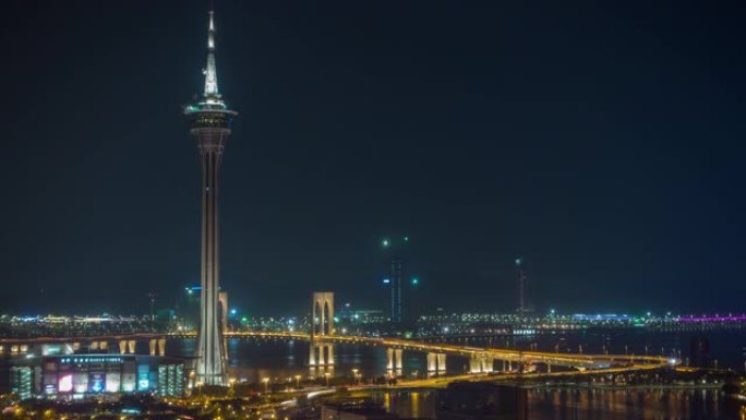夜间照明澳门塔城市景观交通桥屋顶全景4k延时中国