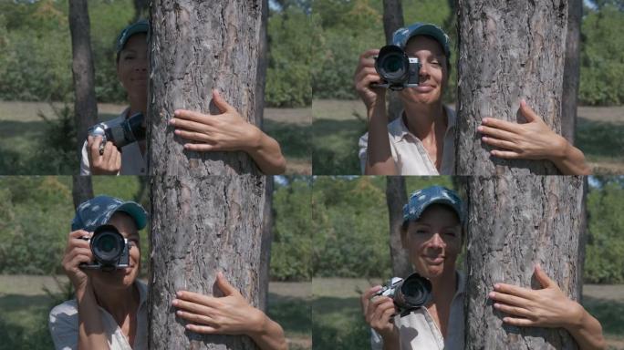 摄影师在树后面。