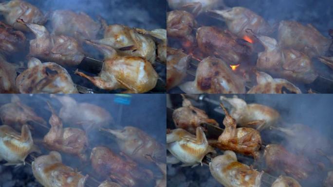 烧烤和美味的烤肉放在烤架上。烧烤派对。鸡肉块在木炭烤架上油炸。