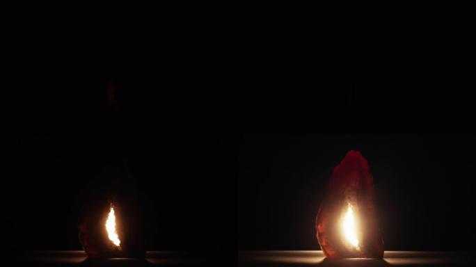 在红灯闪烁期间，矿物内部的火焰变得更亮。