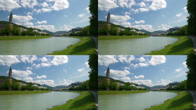 萨尔茨堡著名的中央河边城市景观阳光明媚的一天慢动作全景4k奥地利