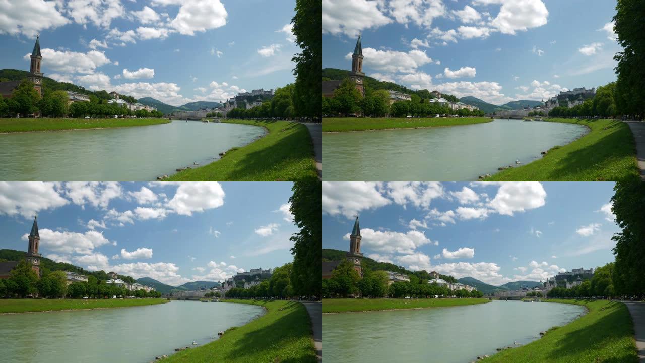 萨尔茨堡著名的中央河边城市景观阳光明媚的一天慢动作全景4k奥地利