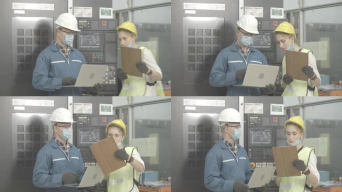 工作的新常态。佩戴安全帽和防护面罩的肖像工程师和主管在工厂工作场所或生产线工作时，面部保护灰尘和病毒