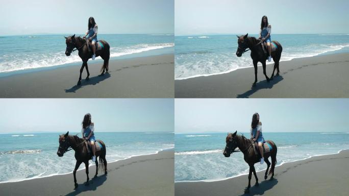 可爱的中国少年在巴厘岛的海滩上骑马