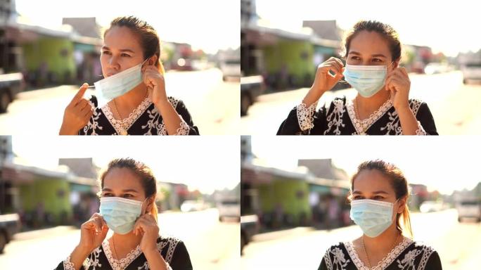 女人戴着防尘口罩，PM 2.5和防病毒新型冠状病毒肺炎