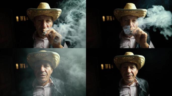 这个人抽雪茄。一位戴着草帽的老年农民在牧场外抽雪茄。浓烟