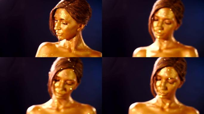 金色皮肤闪闪发光的女人