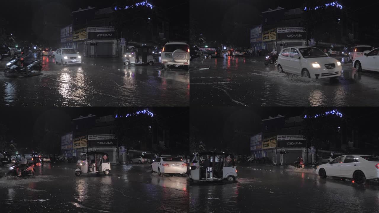 暴雨导致洪水泛滥的街道交通堵塞 (夜间)