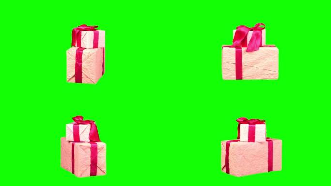 精美包装的礼物，孤立在绿色背景上。特写，旋转。圣诞节或新年。节日包装，礼品盒