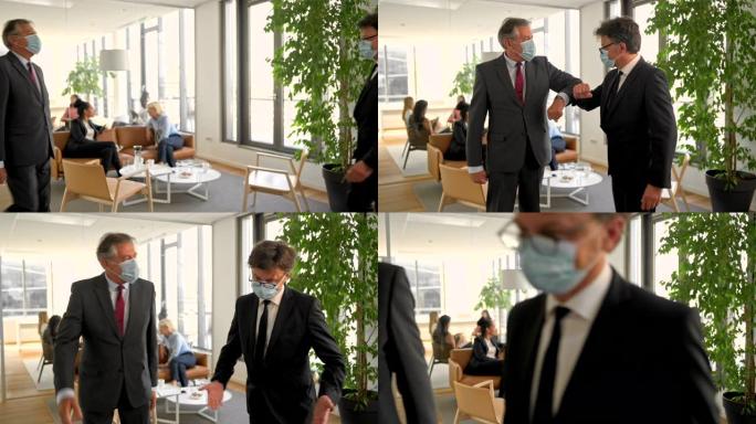 公司专业人士在新型冠状病毒肺炎商务会议后用肘部碰撞打招呼