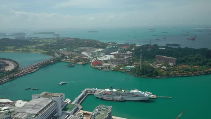 阳光灿烂的一天新加坡圣淘沙岛购物中心海湾码头码头停车场空中全景4k