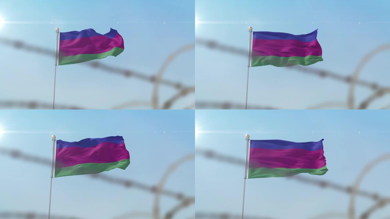 身后飘扬着库班人民共和国的旗帜