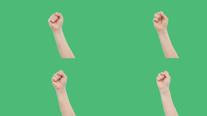 在绿色的背景上，人类举起紧握的手。人们为社会革命而集会。国家叛乱和示威。