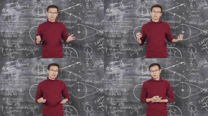 亚洲物理学家在黑板上做演讲