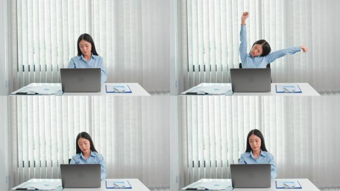 亚洲妇女因在办公室的辛勤工作而感到压力和疲倦
