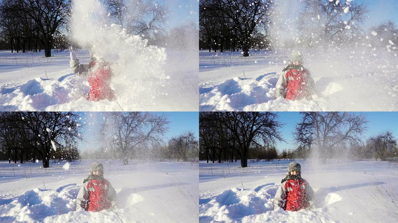 快乐的孩子在冬季公园扔雪