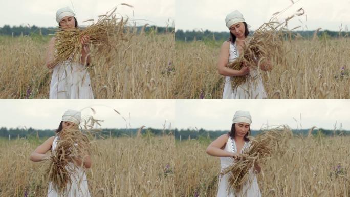 收割谷物作物时，穿着白色连衣裙和方巾的女人编织了一捆麦穗