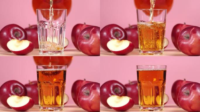 将苹果汁倒入玻璃杯中。