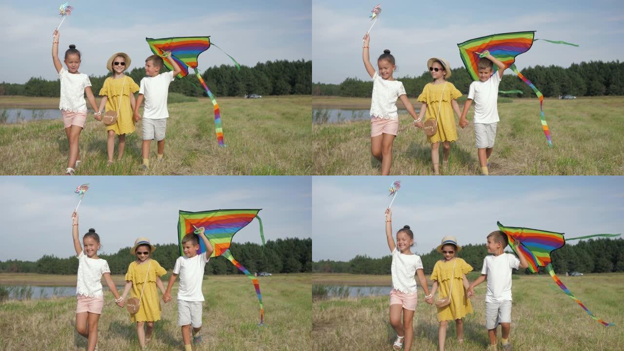 儿童，可爱的女孩和超凡魅力的男孩的关系牵手在草地上玩得开心，并在暑假的周末在乡下放风筝