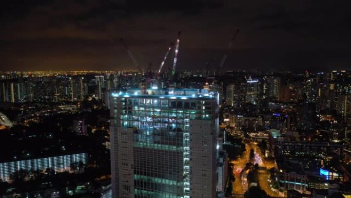 夜间照明新加坡市中心建筑交通街空中全景4k